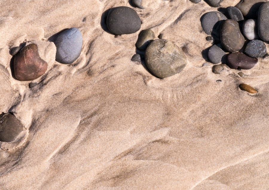 Stones on the sandy beach