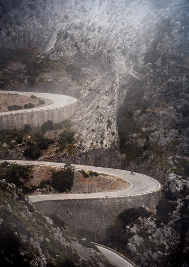 Cyclist climbing Sa Calobra