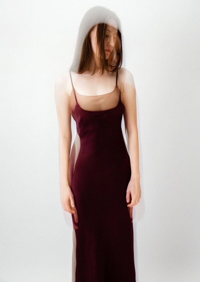 Woman in burgundy dress