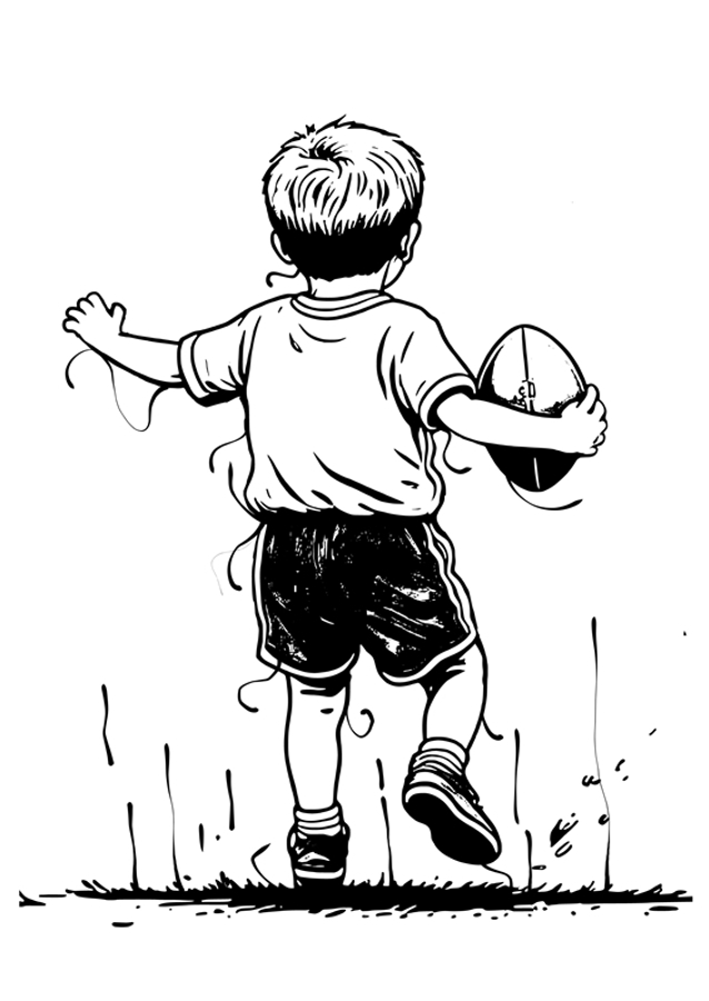 little boy holding rugby ball