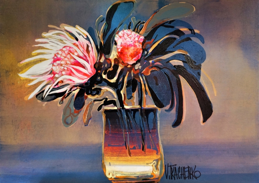 Vibrant Protea Flowers in a Glass Vase