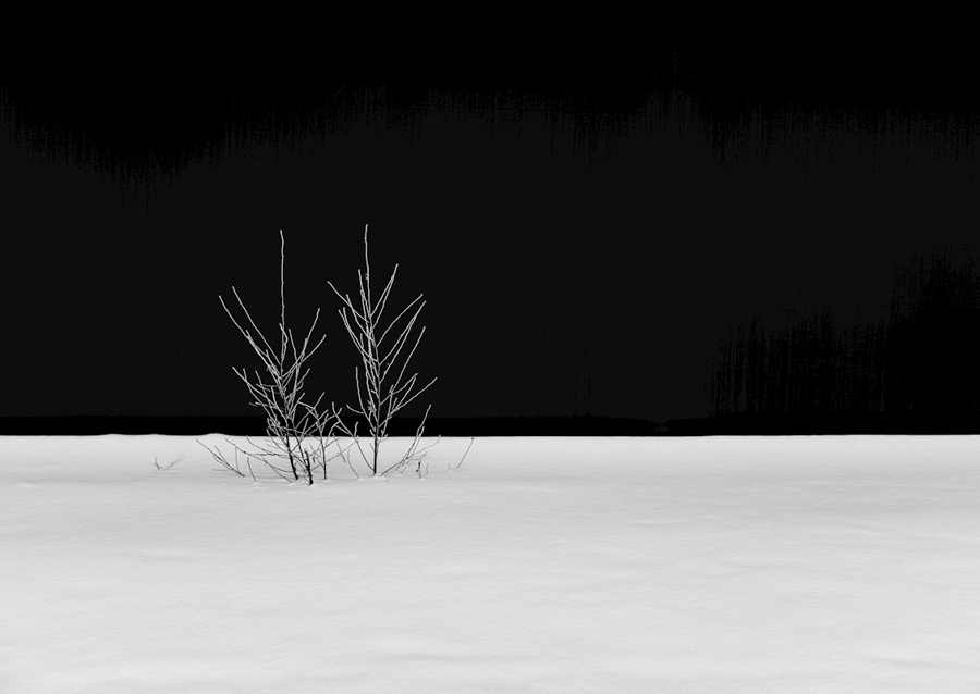 White snow against a black bac
