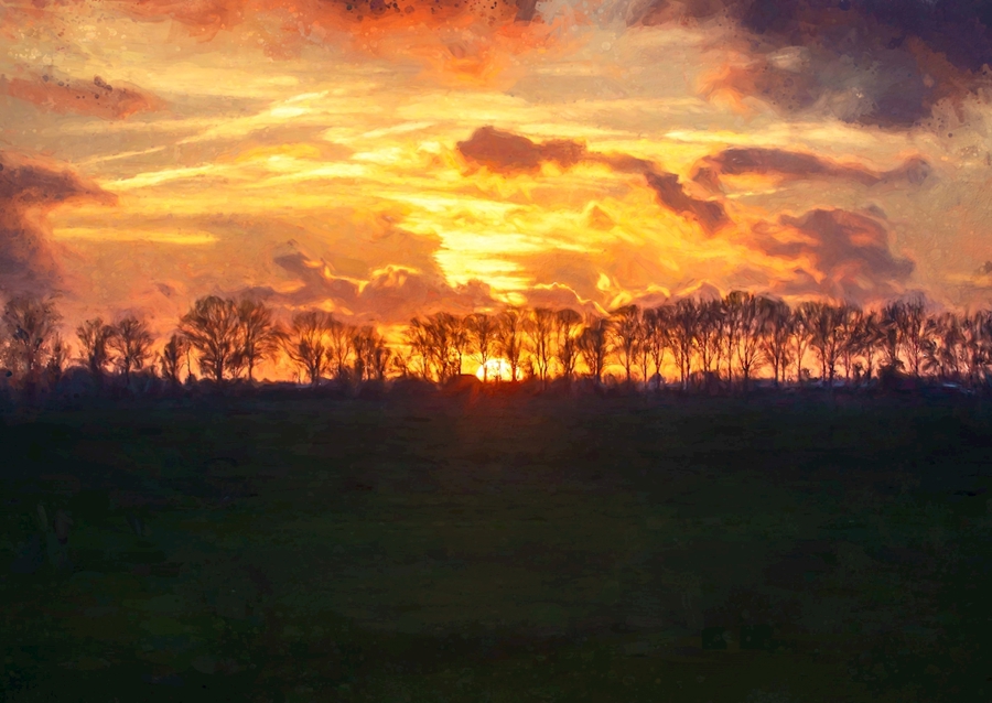 Tramonto su un paese pianeggiante